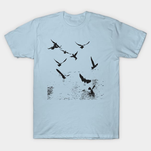 Silhouette Of A Flock Of Seagulls Scavenging Black T-Shirt by taiche